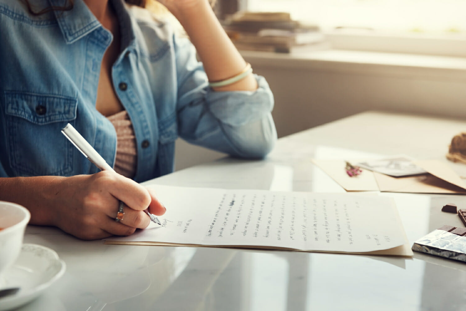 caucasian-woman-writing-letter