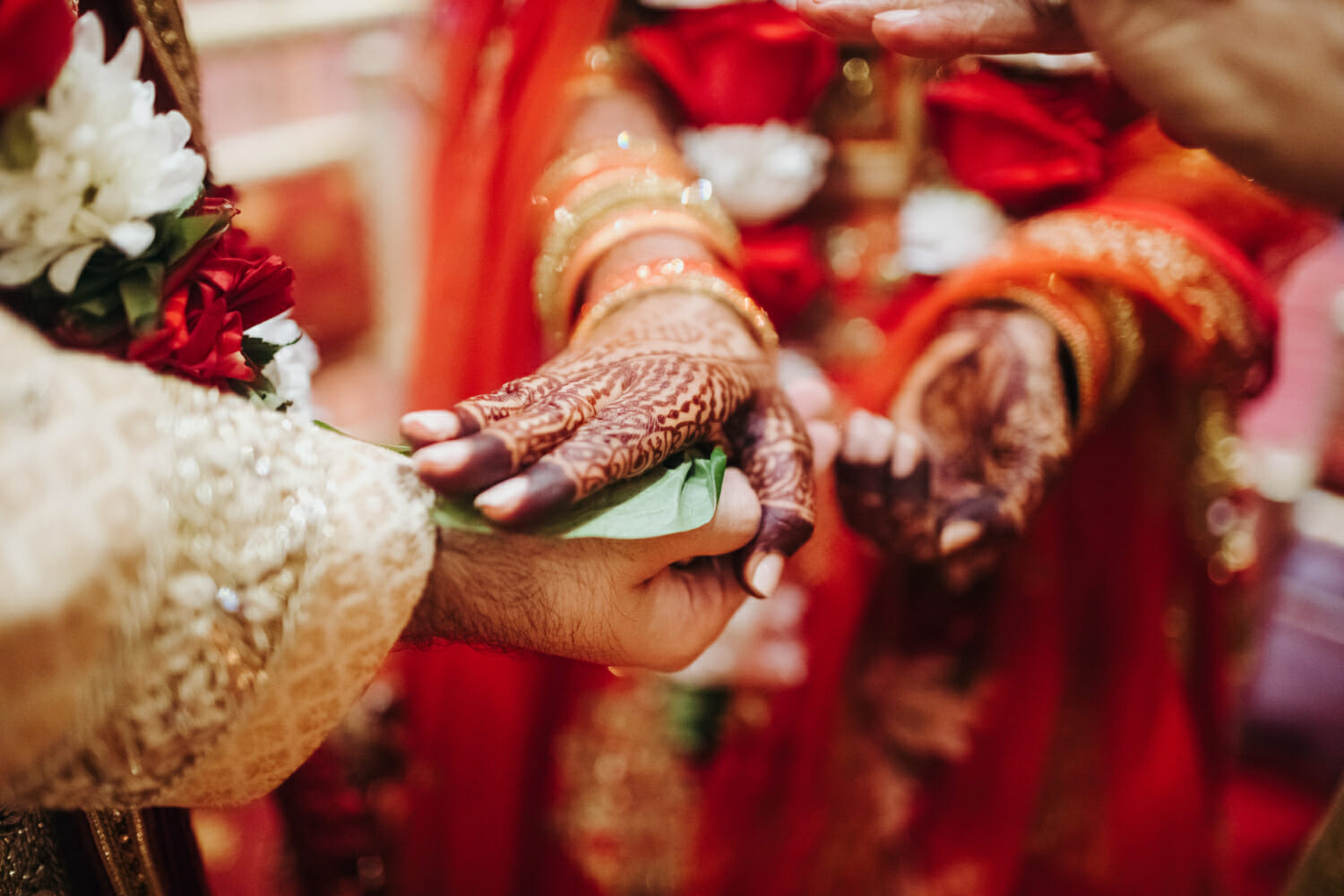 ritual-with-coconut-leaves-during-traditional-hindu-wedding-ceremony